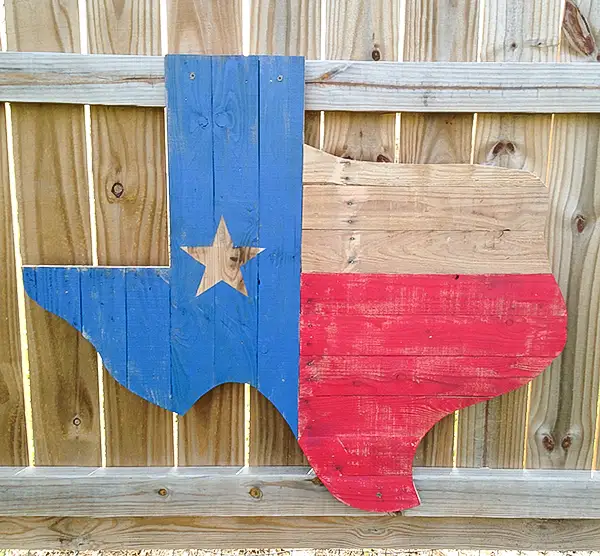A Texas flag in the shape of the state.